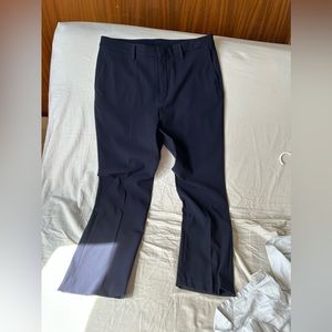 Navy blue ankle length UNIQLO slacks.